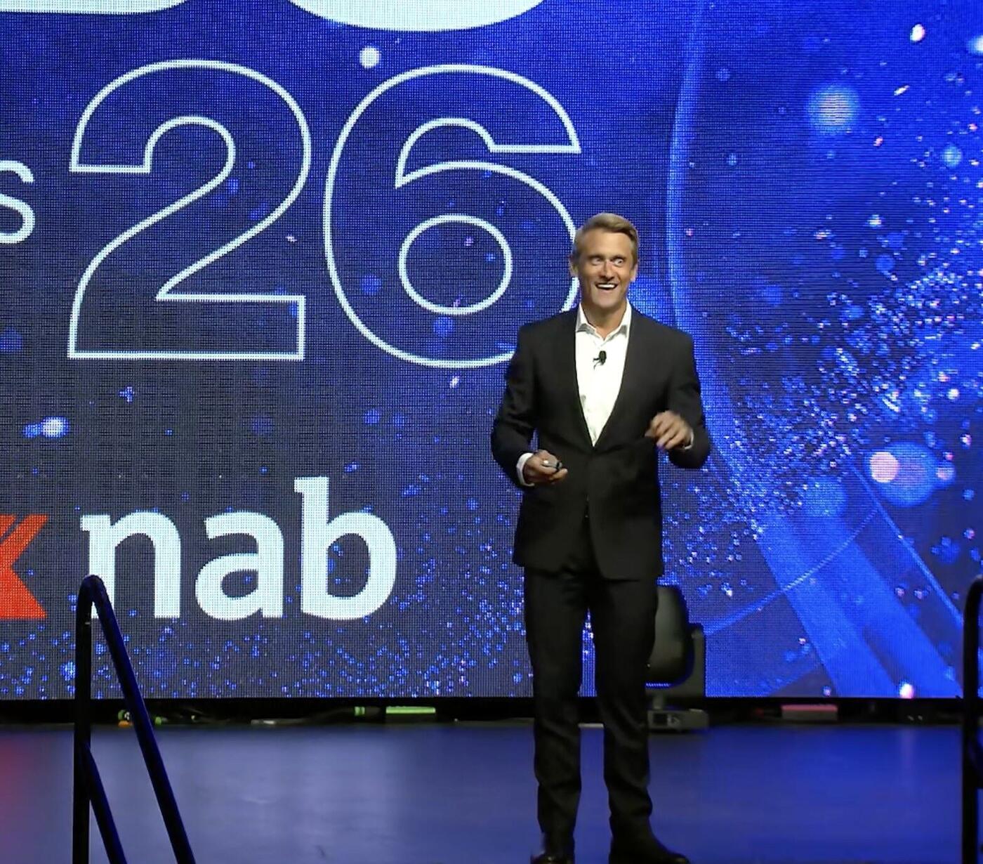 Adam Franklin delivering an AI keynote at the Better Business Summit, NAB principal partner